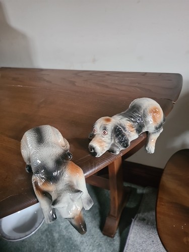 Leg over ceramic mantle dogs - over,