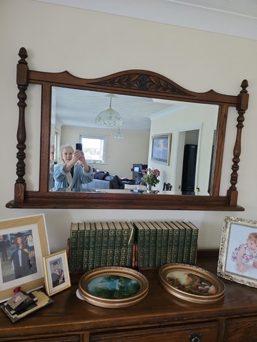 Old charm over mantle mirror - over,