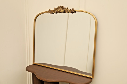 Gold arched metal over-mantle
